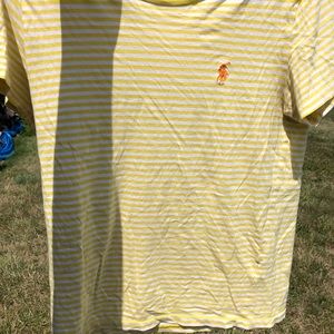 a yellow white stripped shirt size M